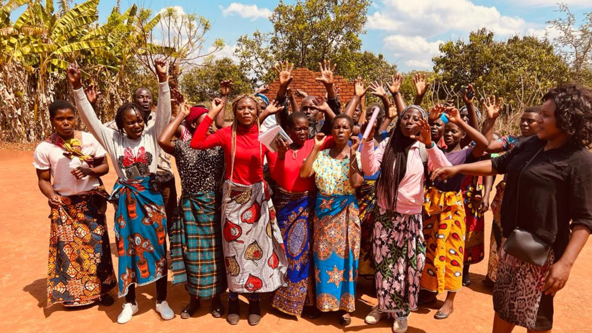 Ripple Africa strike a pose in Malawi to celebrate match funding