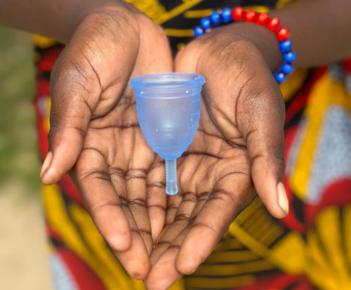 Distributing menstrual cups to schoolgirls in Malawi
