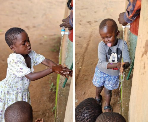 Children wash their hands in Malawi