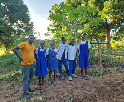 First pawpaw for Standard 6 pupils in Malawi