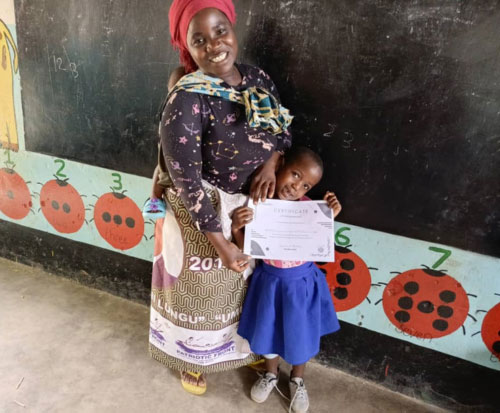 A proud Mum with her daughter at graduation in Malawi
