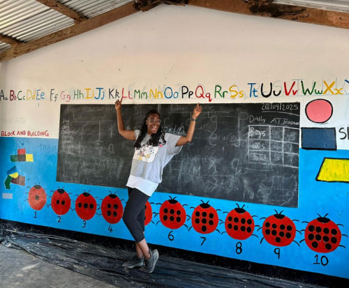 Volunteer Simone helping makeover a pre school in Malawi