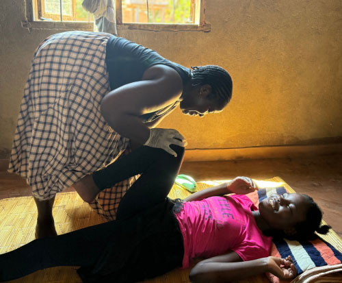 Fortune receiving physiotherapy at home in Malawi