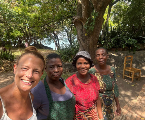 Hayley with some of the team at Mwaya Beach