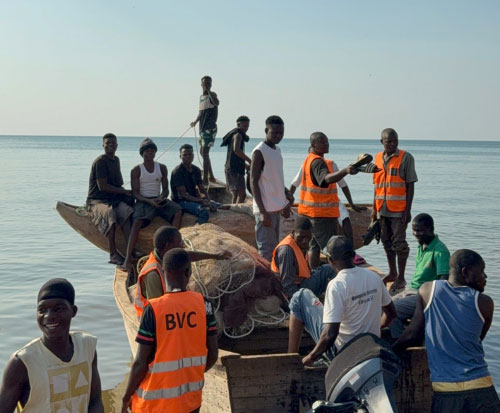 Beach Village Committee boarding a patrol boat