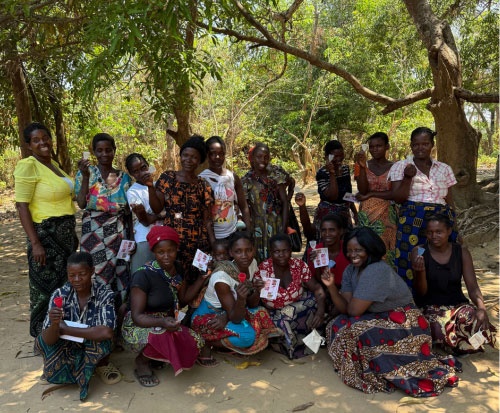 A group of women holding their brand new menstrual cups in Malawi