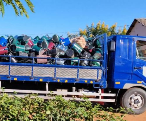 Delivery of watering cans