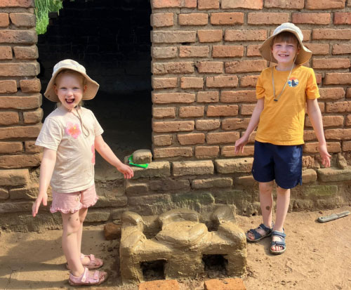Reuben and Alice helped build a cookstove