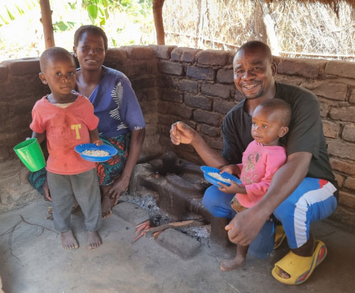 Zione and Kalikokha love their cookstove