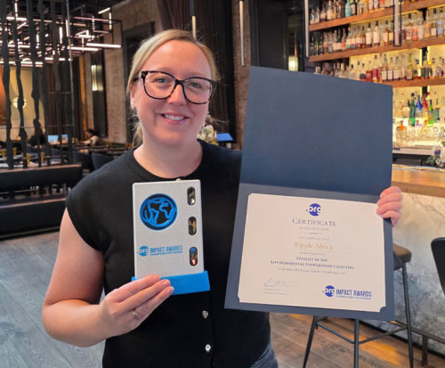 Our COO Nikki Khoram with our Finalist Award and certificate